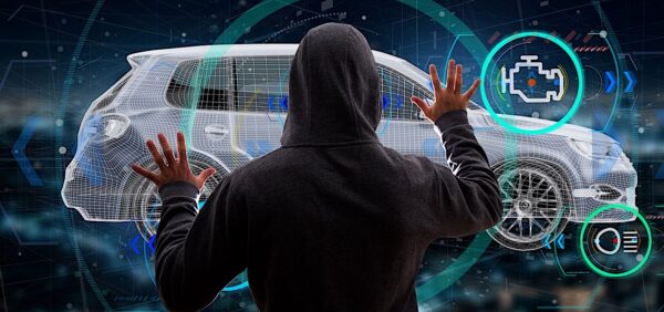 Hacker accessing connected car systems concept.