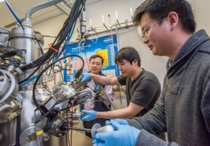 VO2 Spectroscopy Berkeley Lab scientists Junqiao Wu, Fan Yang, and Changhyun Ko (l-r) are working at the nano-Auger electron spectroscopy instrument at the Molecular Foundry, a DOE Office of Science User Facility. They used the instrument to determine the amount of tungsten in the tungsten-vanadium dioxide (WVO2) nanobeams. (Credit: Marilyn Chung/Berkeley Lab)
